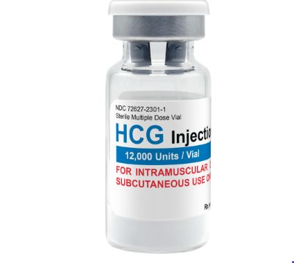 Vial of HCG 5000iu with syringe placed on a sterile medical tray, representing hormone therapy for testosterone support and fertility treatment.